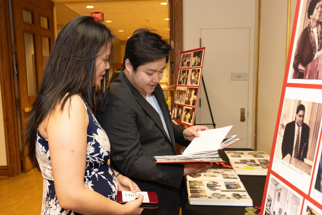 Picture of two women looking at a book